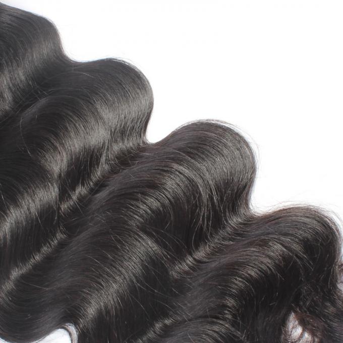 Paquets de cheveux de Vierge de vague de corps d'usine de Qingdao, trame brésilienne pure de cheveux