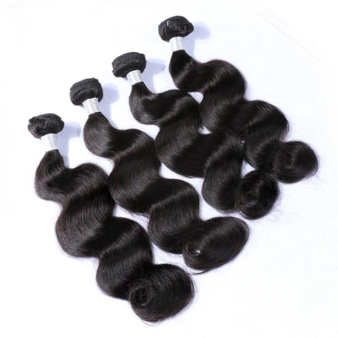 Trames originales péruviennes noires naturelles de cheveux de Vierge de la vague 100% de corps de cheveux